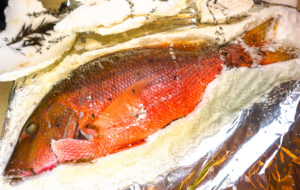 "Salt Cracked Fish" by Let's Cook That licensed under CC NC ND 4.0 salt baked fish